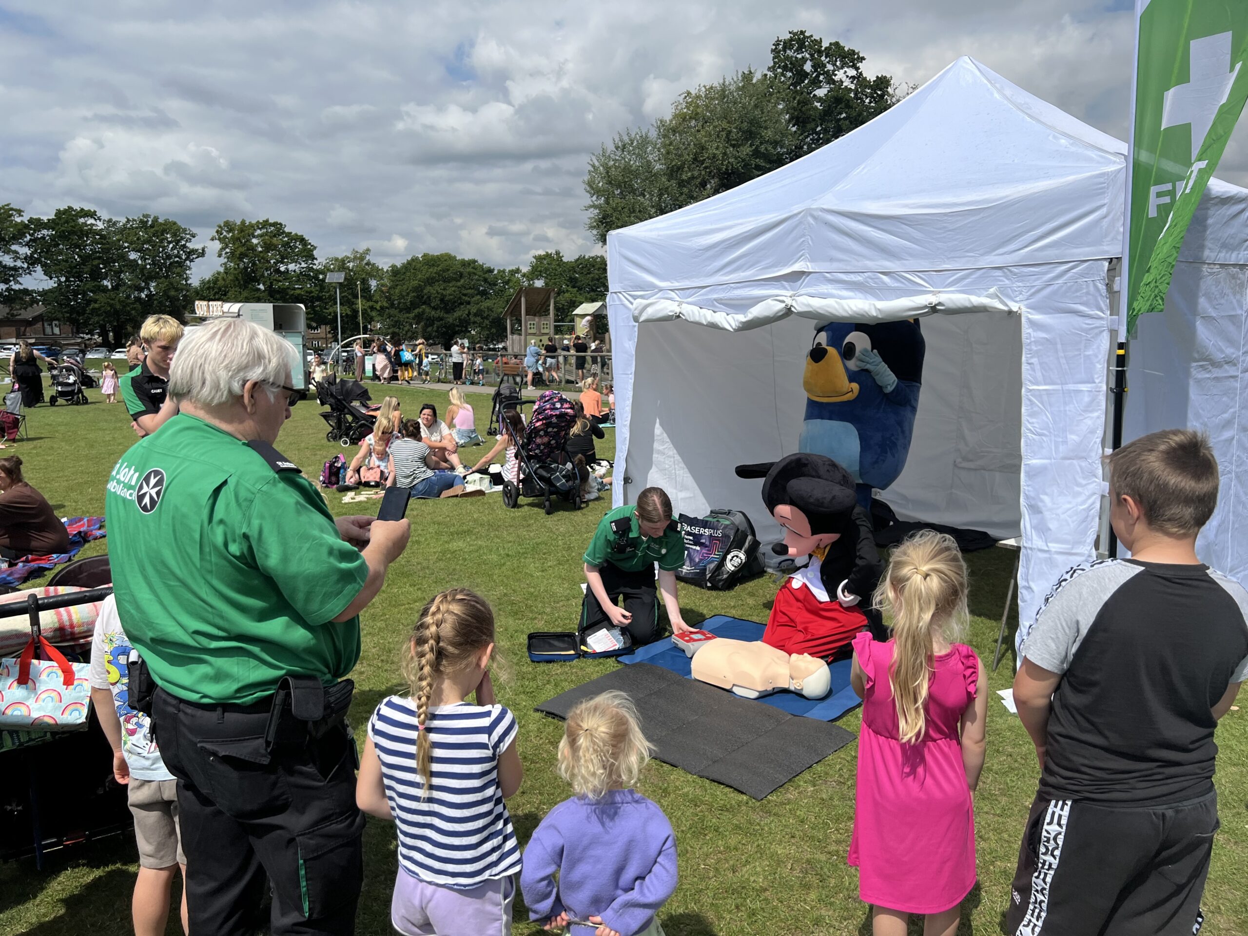 Picnic in Park Mickey doing CPR